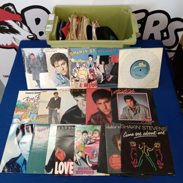 Collection of 7" single vinyl records mostly shakin stevens