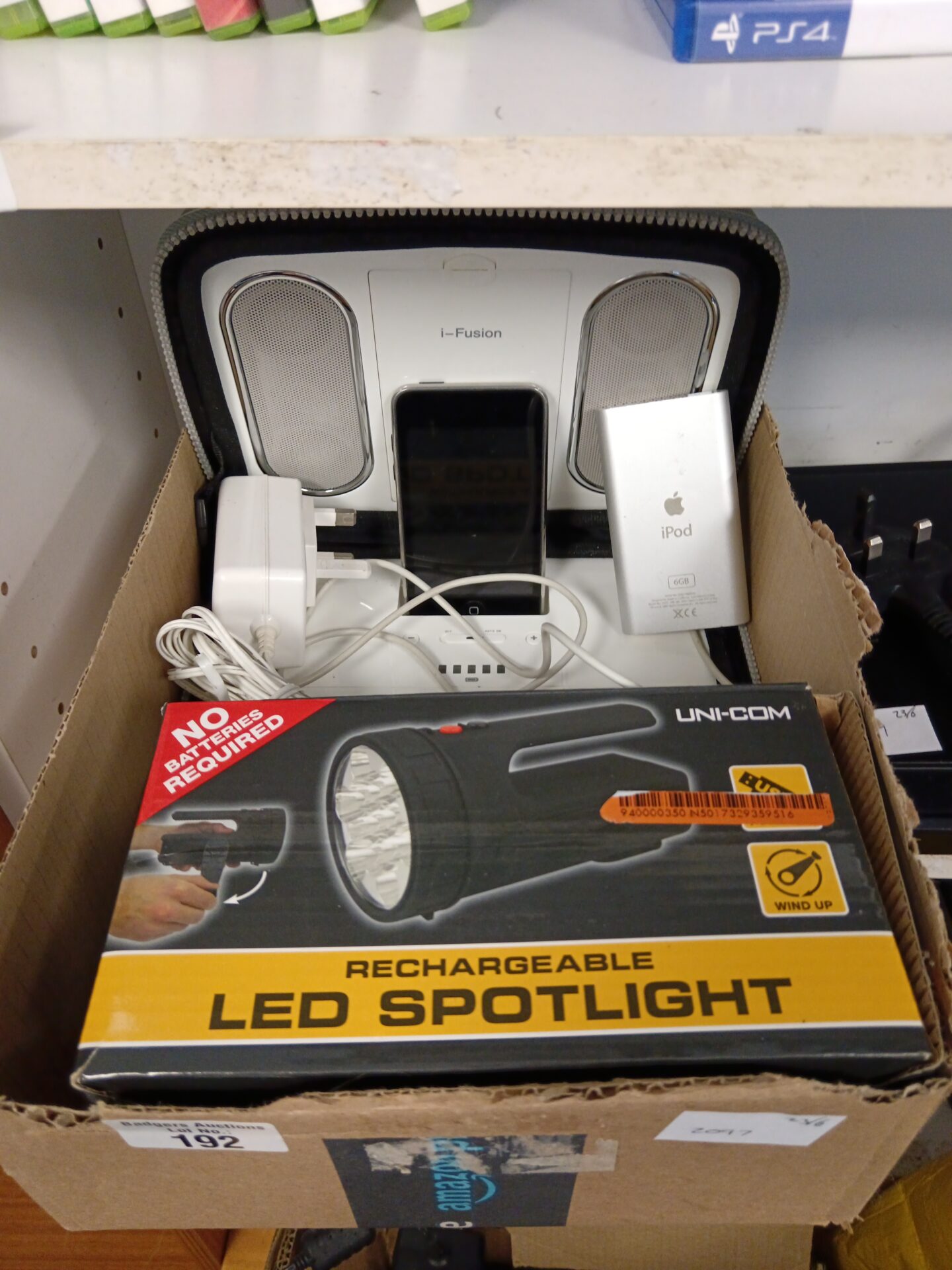 Two apple iPods, ifusion docking station & led spotlight