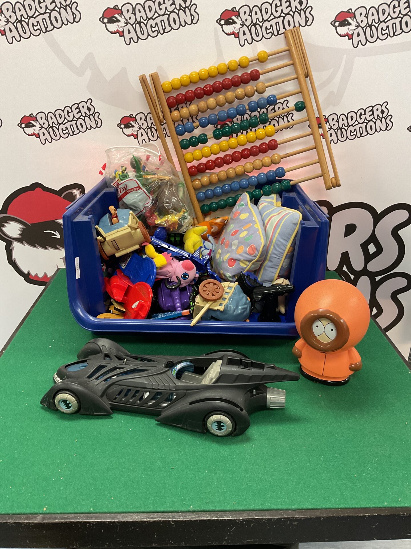 Box of assorted childrens toys incl. batmobile and kenny from south park