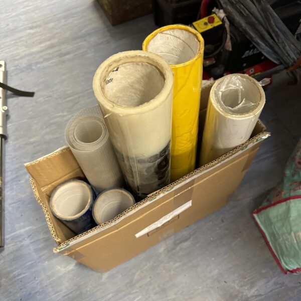 Six rolls of assorted floor protector