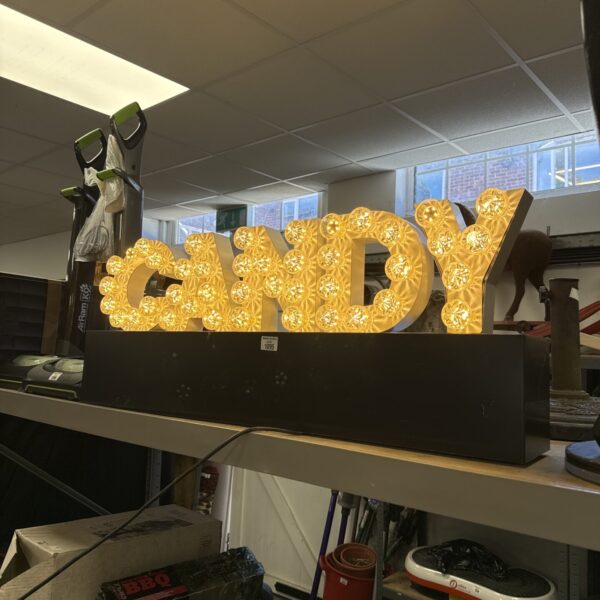 Light up candy store sign 39” length - working, missing some caps from lights