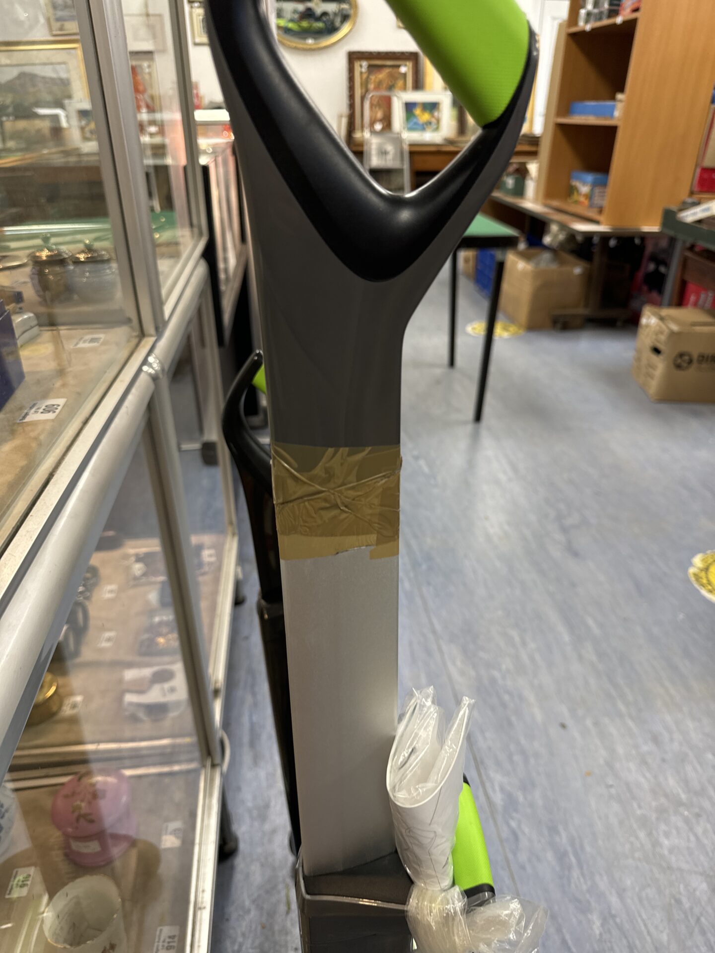 Two gtech cordless hoovers with one charger - untested, handle repaired with tape on one - Image 2