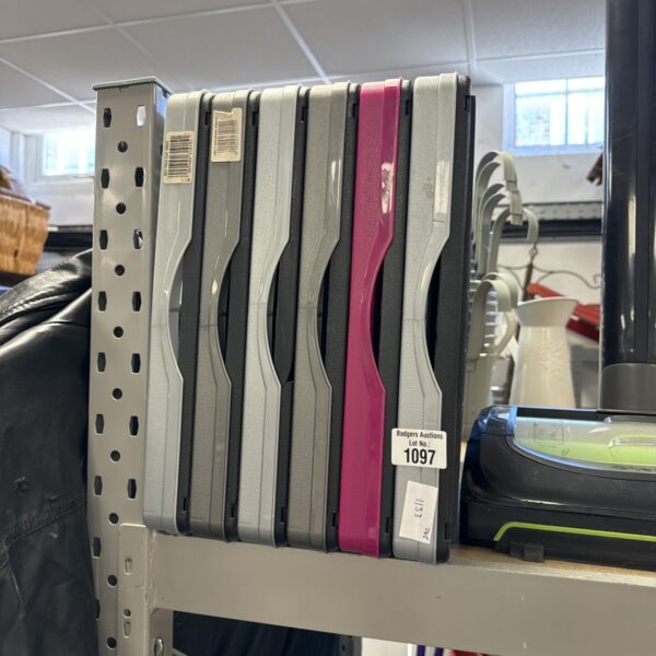 Six folding plastic storage crates