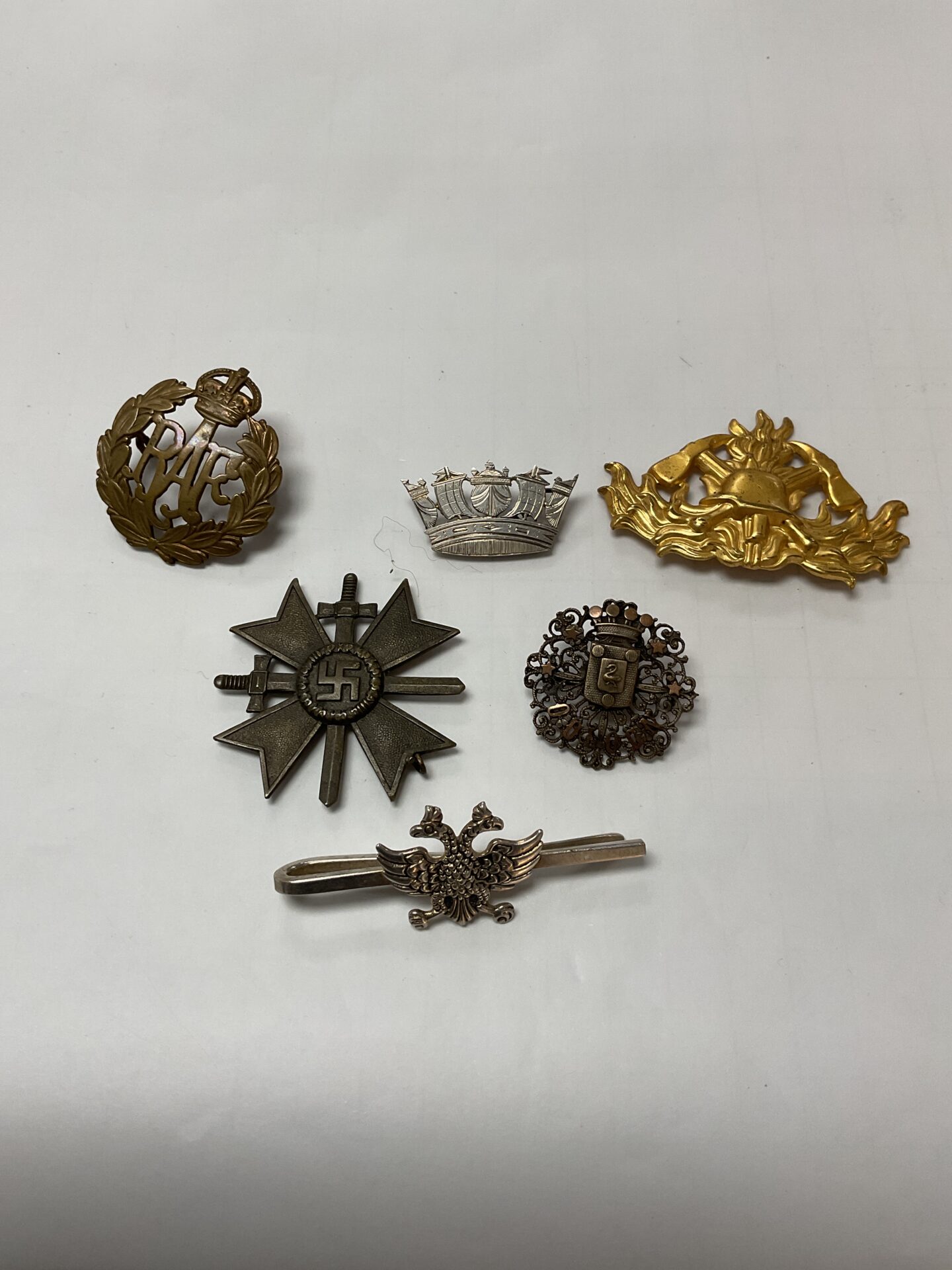 Collection of Assorted Vintage Military Cap Badges and Medal