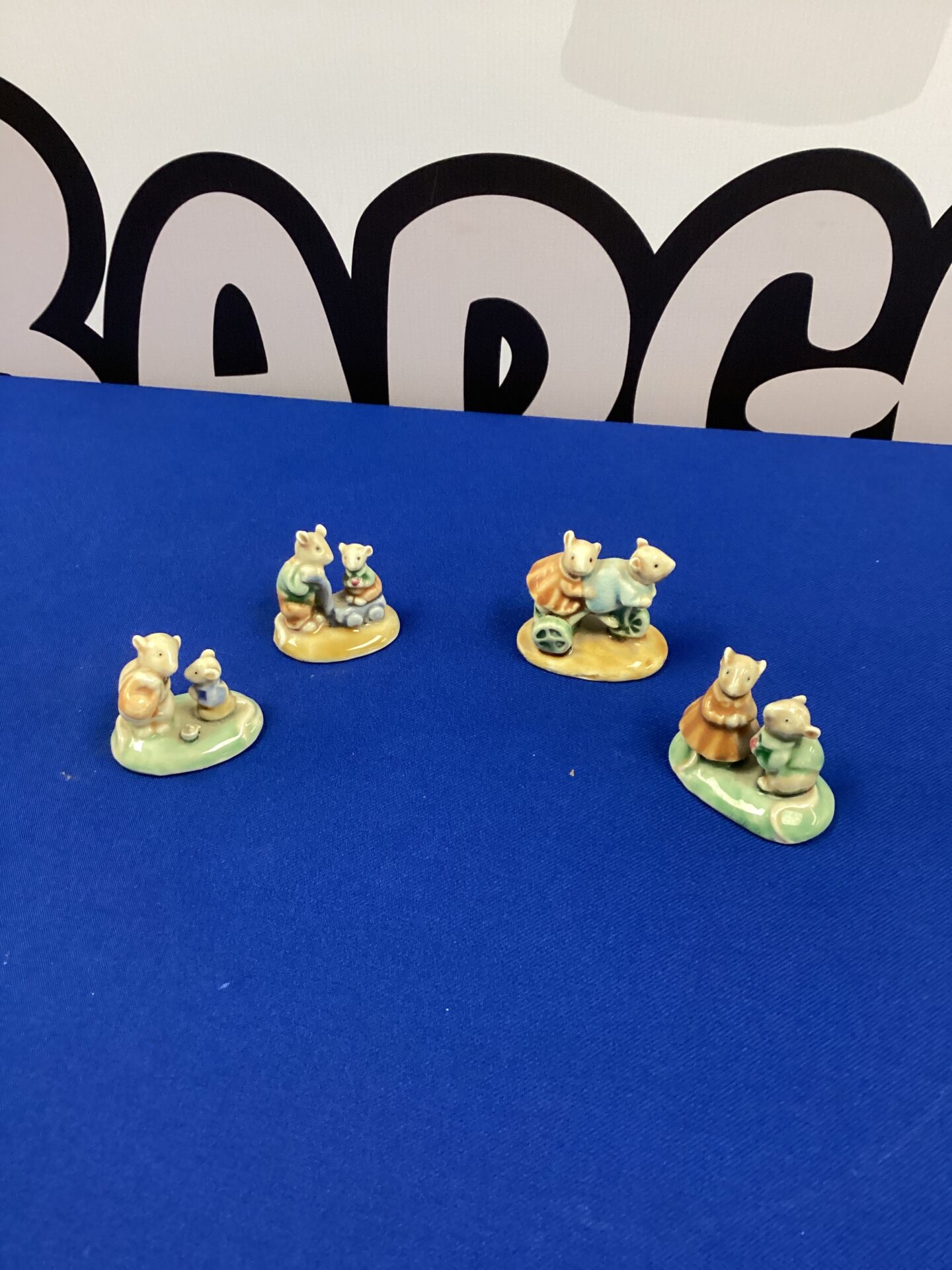 Four vintage glazed ceramic mice figurines