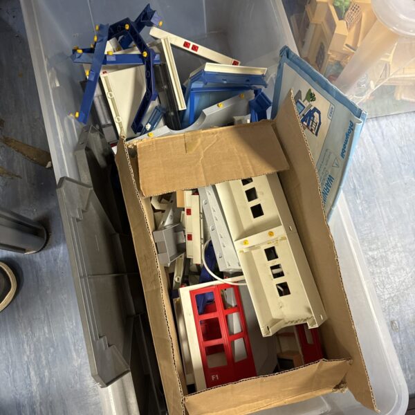 Box of retro playmobil items