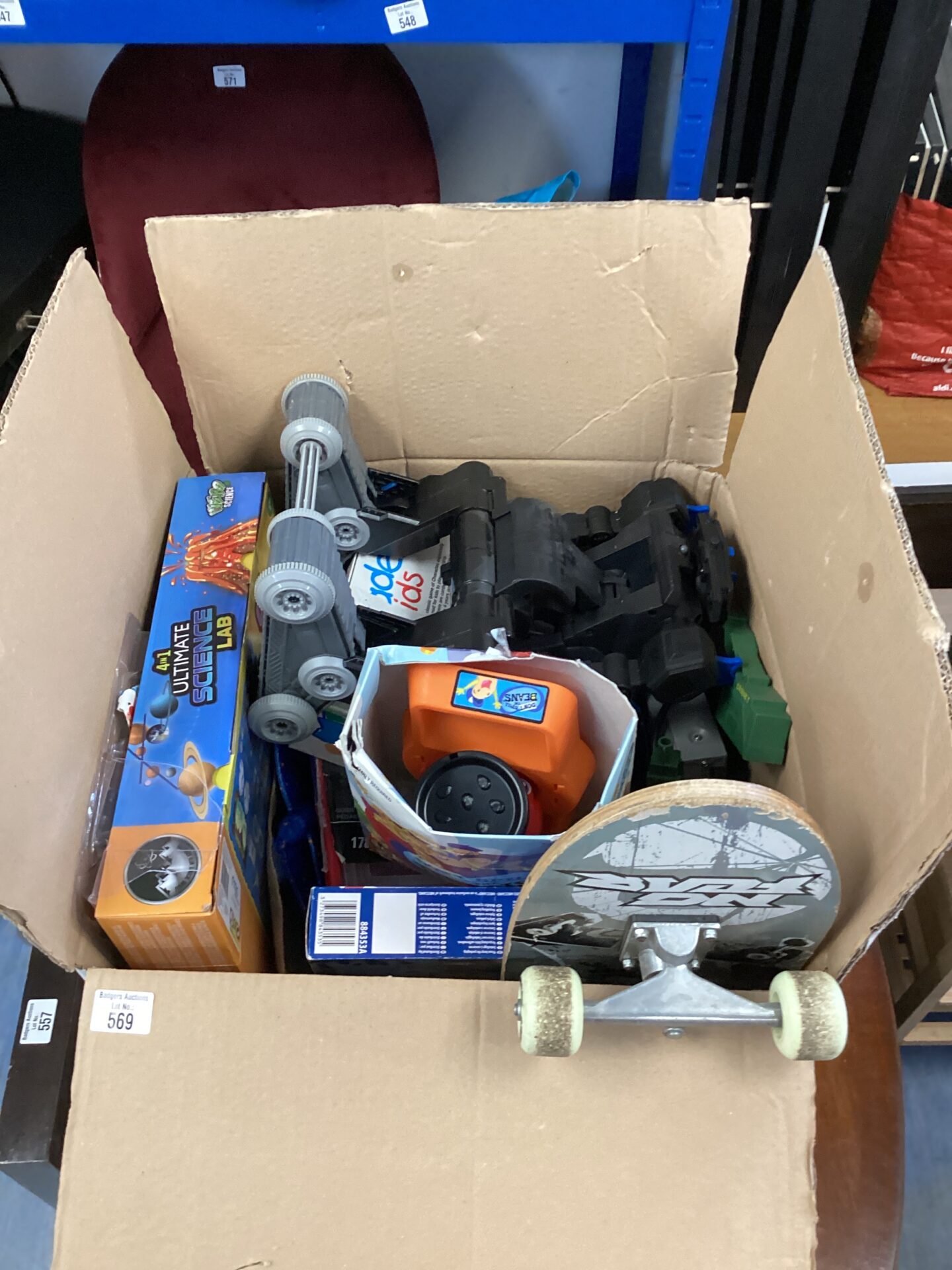 Box of kids toys inc batman mech, ultimate 4 in 1 science lab & no fear skateboard