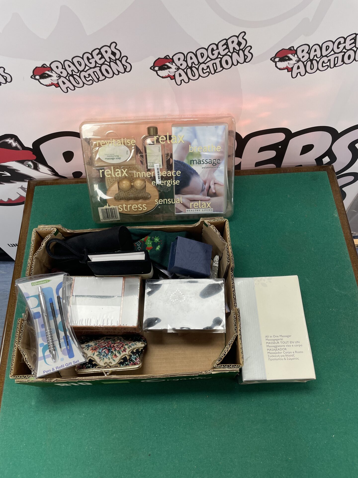 box of mixed items with all in one massager