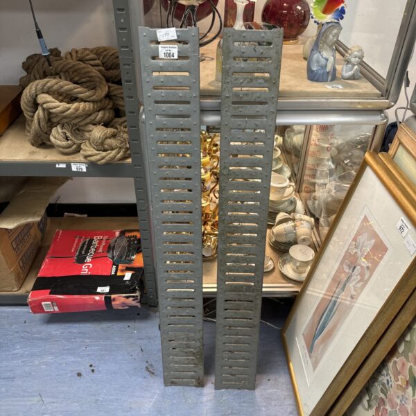 Two 39.5” lengths of galvanised drainage gully covers