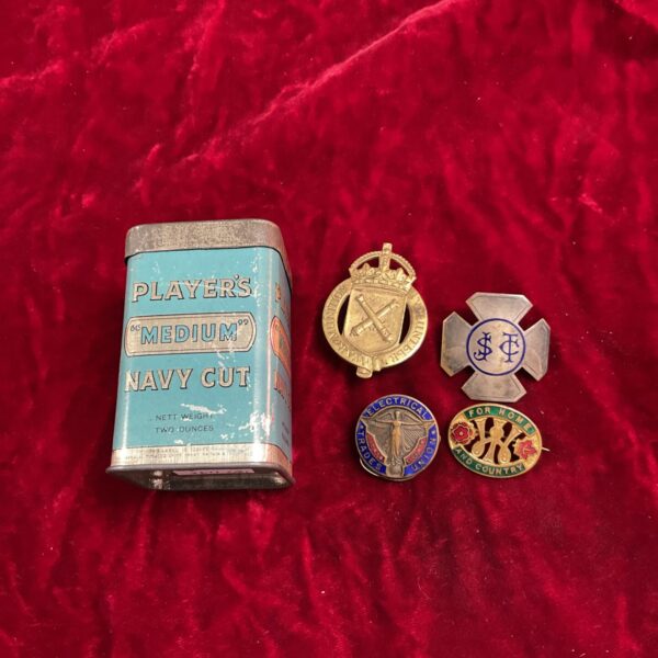 Player medium navy cut tin and four badges