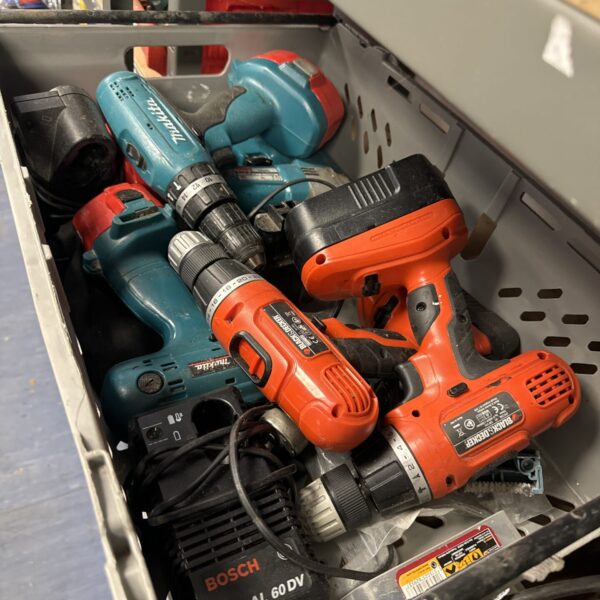 Tray of assorted untested cordless drills with some chargers