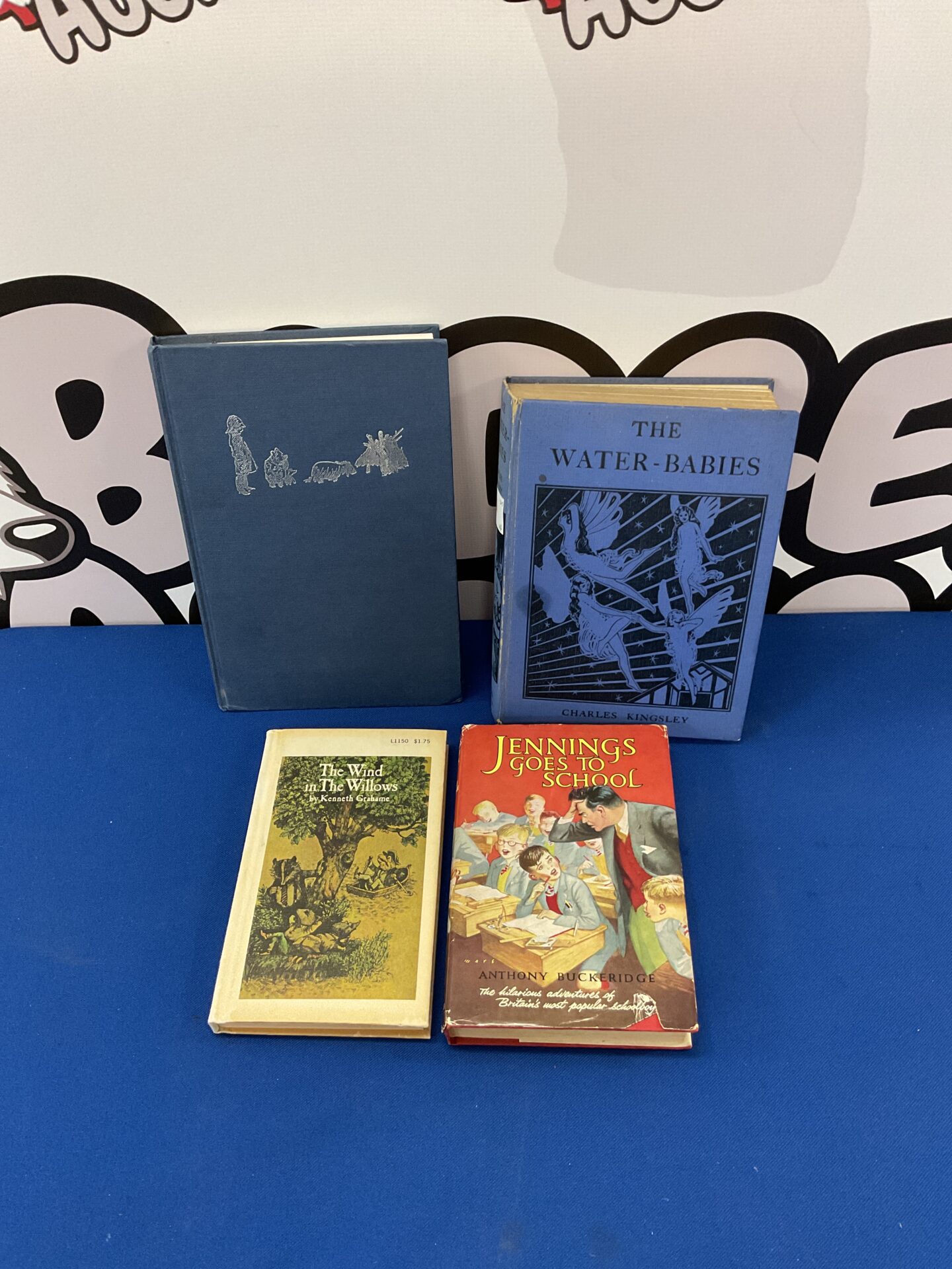 Four vintage childrens books including wind in the willows & the water babies