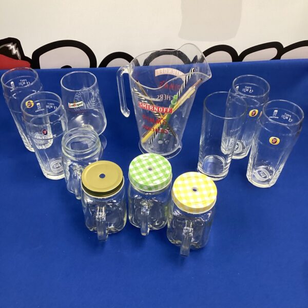 Selection of drinking jars, fosters pint glasses & pims jug