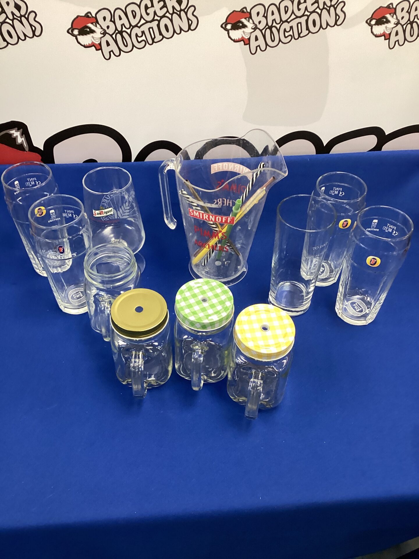 Selection of drinking jars, fosters pint glasses & pims jug