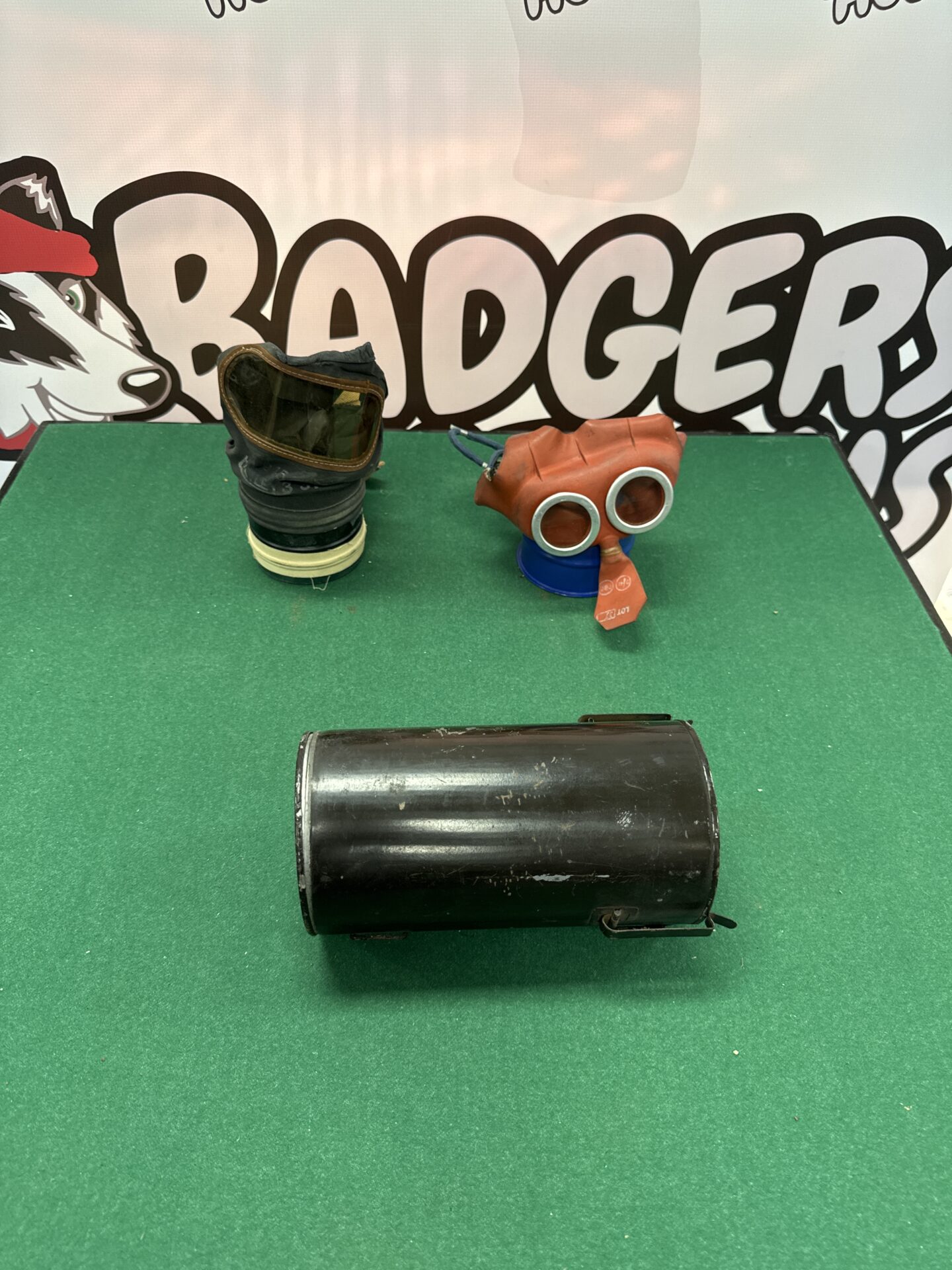 Two war era children’s gas masks (one on the left had perished rubber)