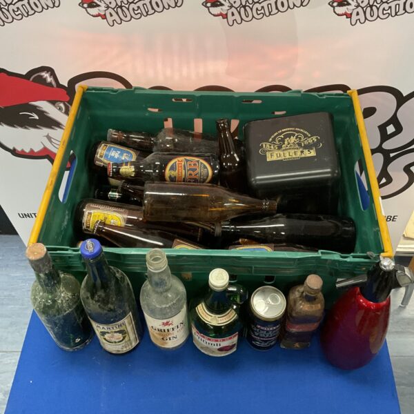 Collection of vintage bottles, soda syphon & ice bucket