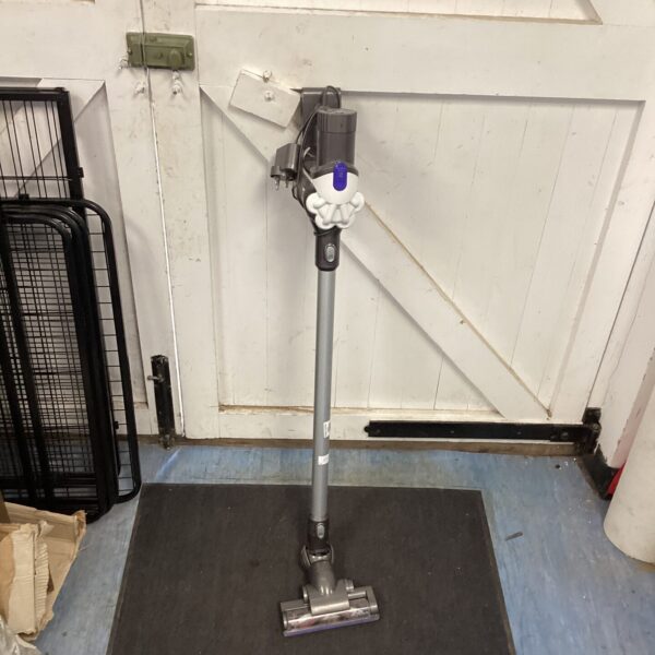 Dyson Cordless Vacuum Cleaner with charger in working order