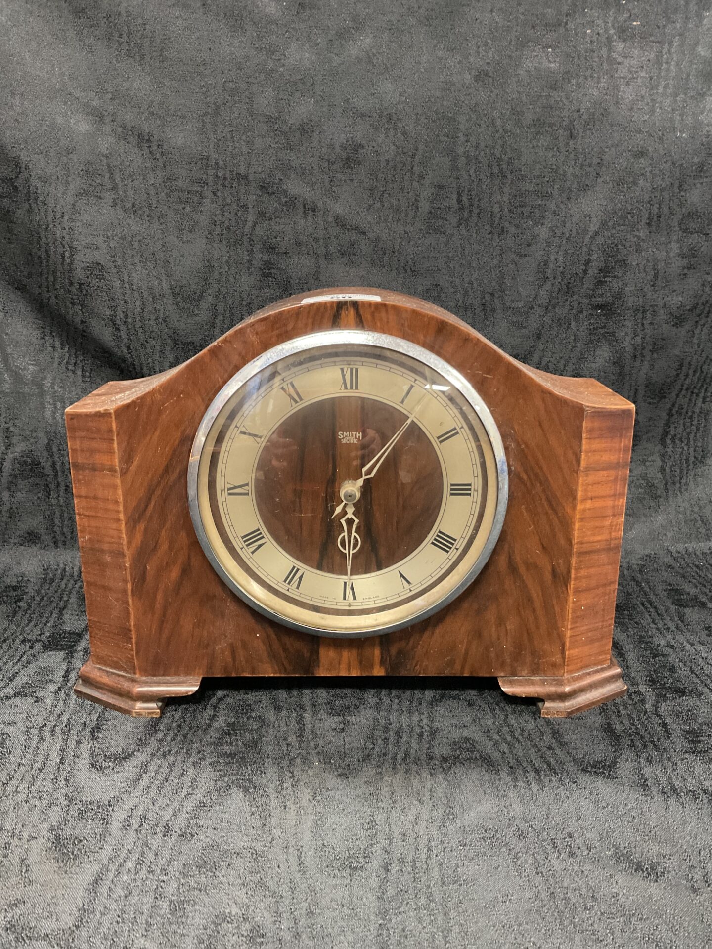 Vintage mantle clock with Roman numerals.